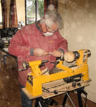 Chris Withall turning a small bowl